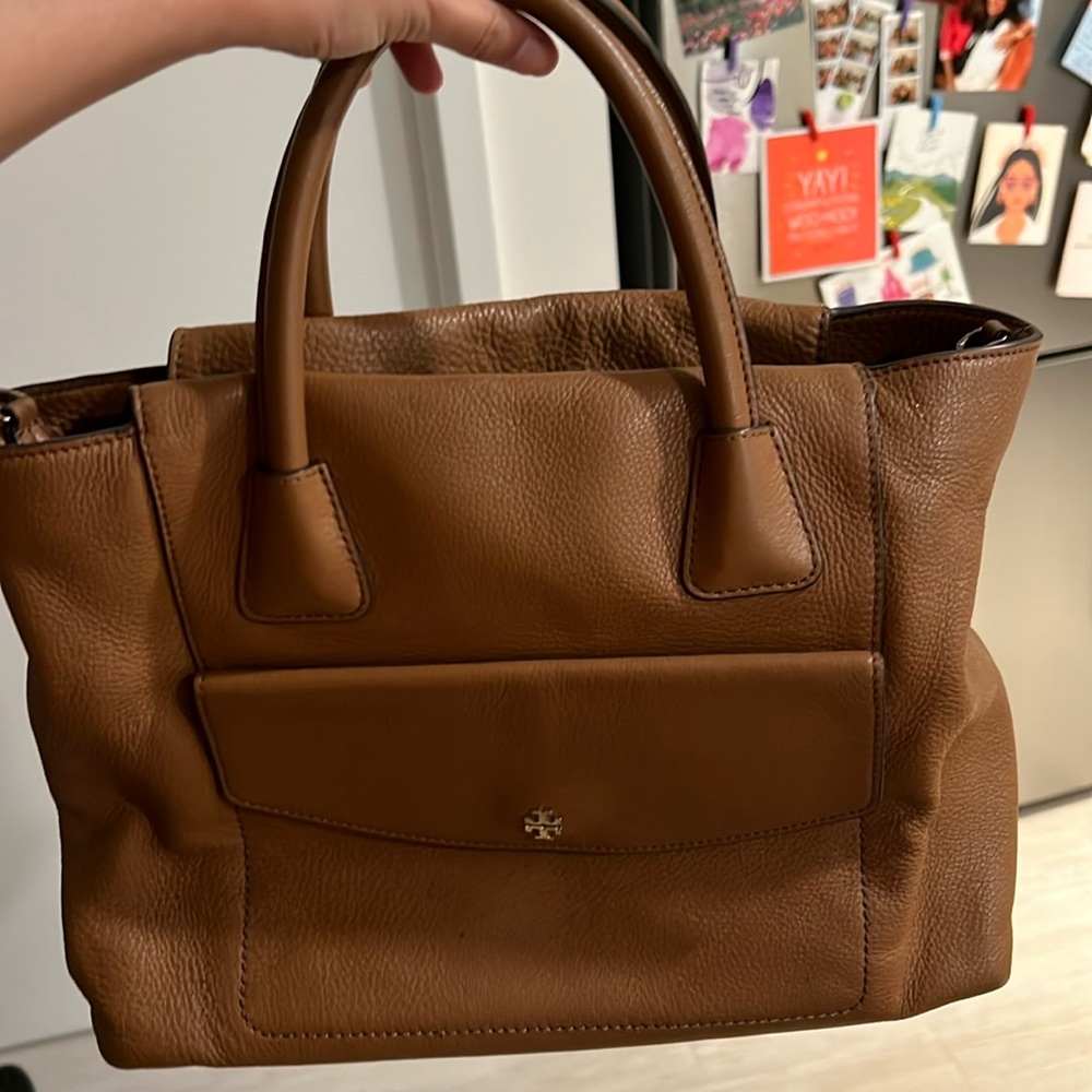 Brown Tory Burch bag.